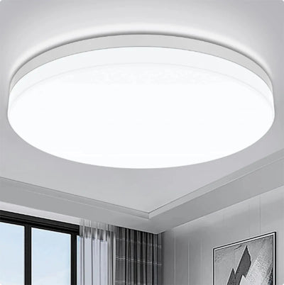 Ultra-thin round LED ceiling lamp installed in bedroom